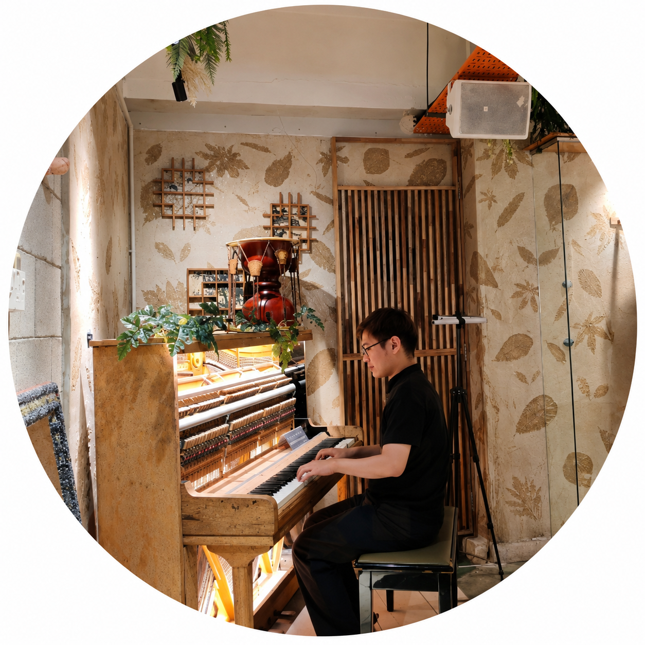 Lau playing piano